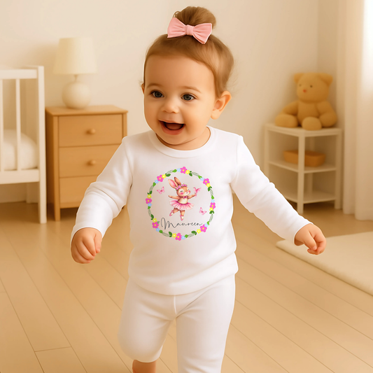 Personalised baby pyjamas: A set of personalised baby girl clothes featuring a dusky pink ballet bunny surrounded by a floral wreath. The pyjamas are designed for ages 0-2 years and includes flower-themed pyjamas. It can be customised with a name, making it a thoughtful new baby gift: Personalised Baby Girls Dusky Pink Ballet Bunny Floral Wreath 0-2 Years, New Baby Gift with Name, Flower Pyjamas, Custom Baby Girl Clothes