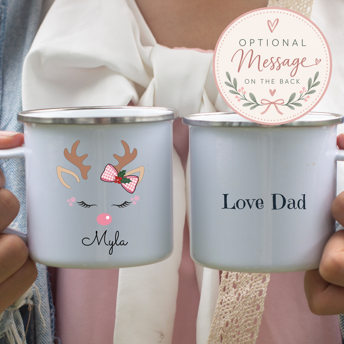 Personalised reindeer Christmas mug for girls featuring a pink bow and child’s name, available in polymer, ceramic and campervan styles.