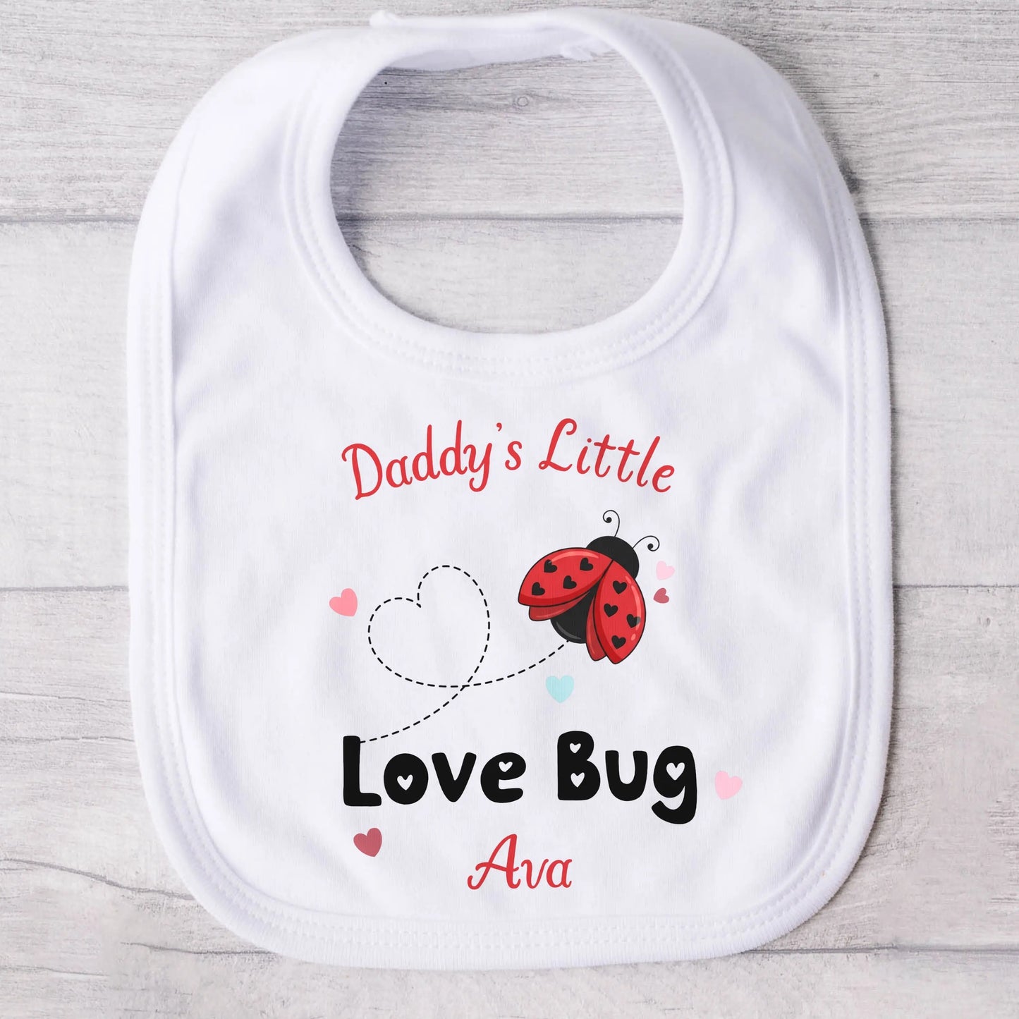 Valentine Baby Outfit personalised for Valentines day. Baby grow, vest and bib with a love bug (ladybird) design