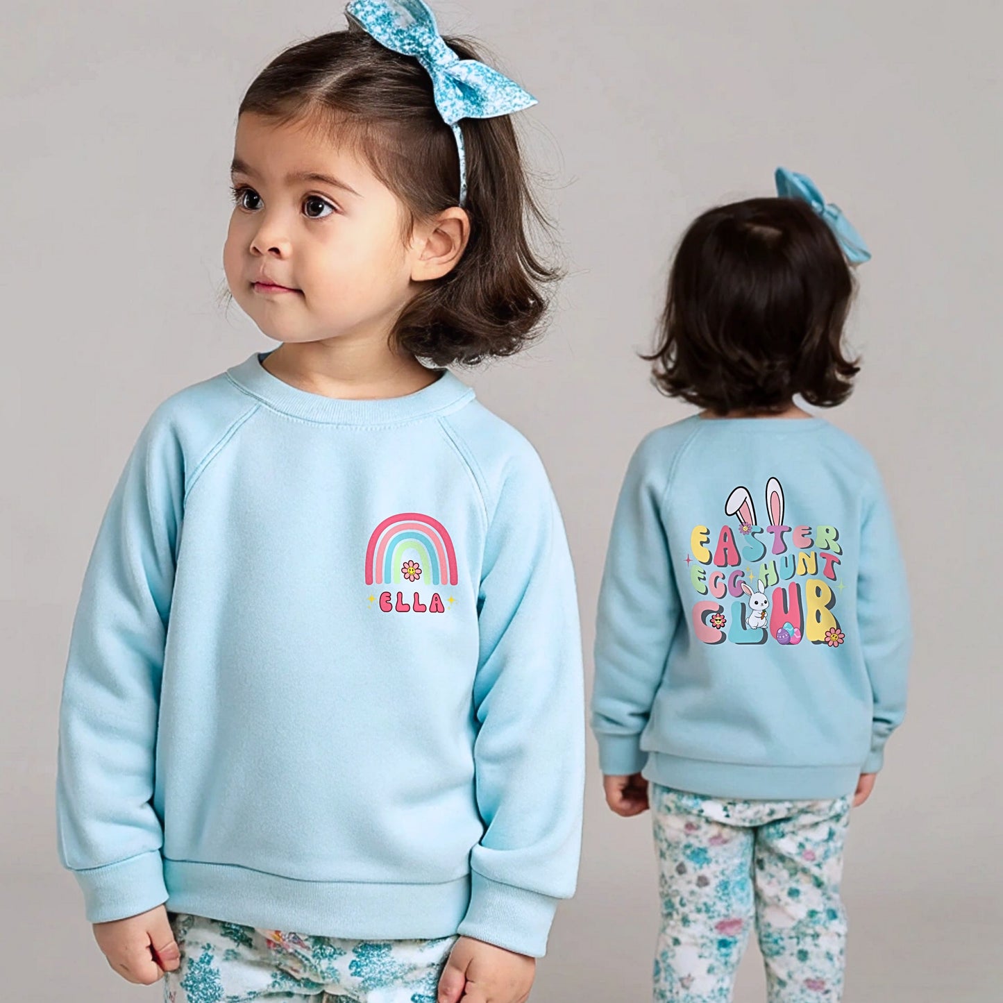 Girls personalised Easter sweatshirt with rainbow name design on front and Easter Egg Hunt Club bunny print on back