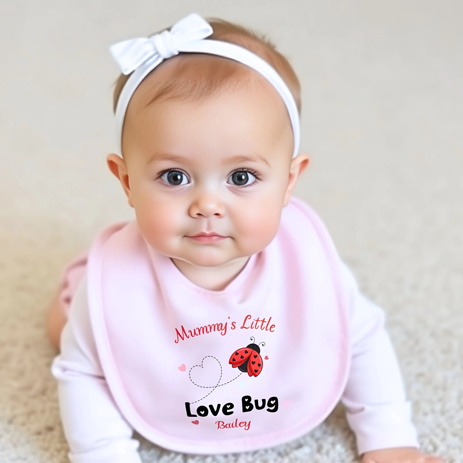 Valentine Baby Outfit personalised for Valentines day. Baby grow, vest and bib with a love bug (ladybird) design