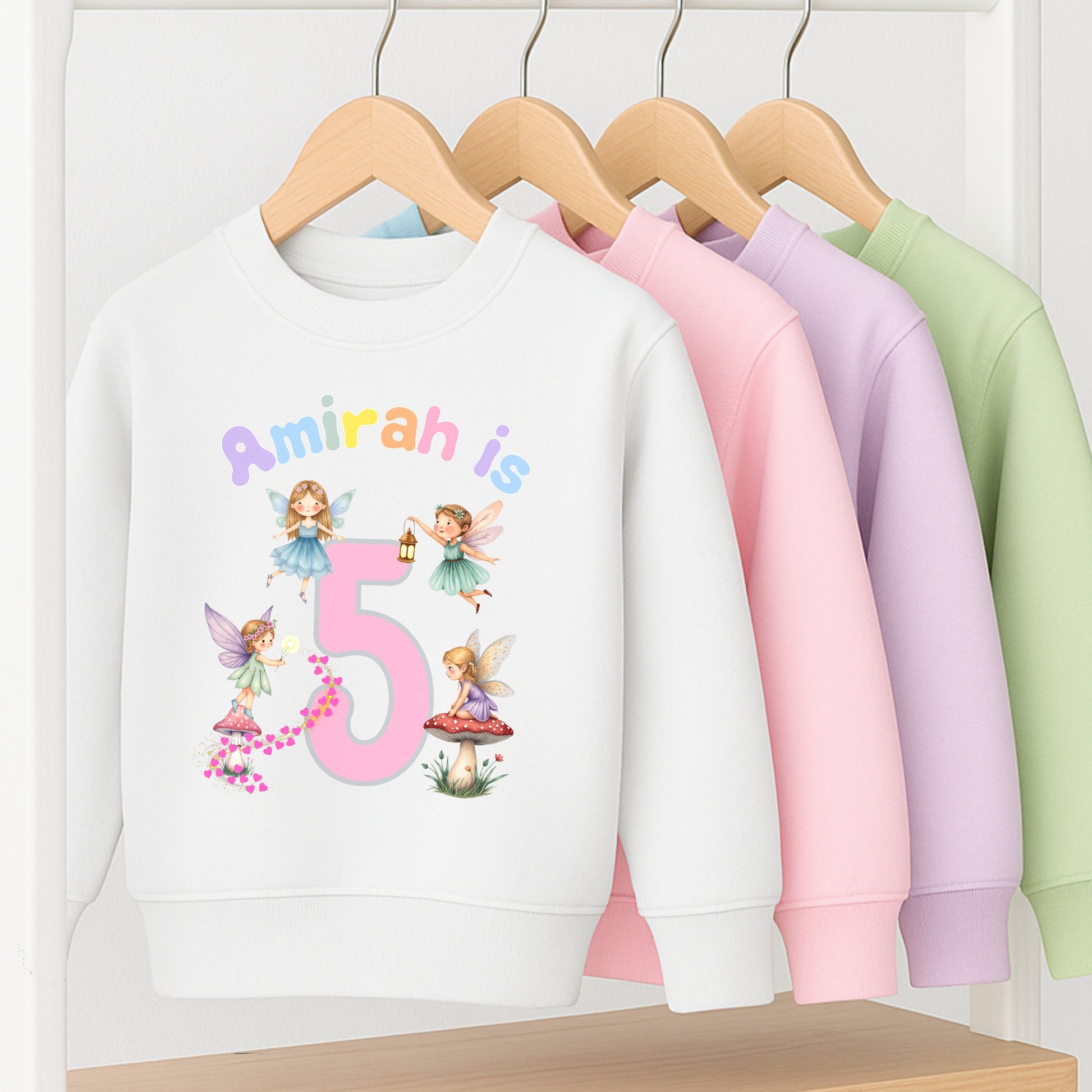 personalised fairy birthday sweatshirt for girls. Custom name & age design, perfect magical birthday outfit or gift for toddlers and children.