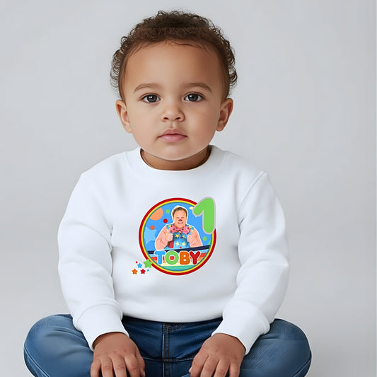 Mr Tumble birthday sweatshirt for kids featuring colourful character design, personalised name option, and bright festive details.
