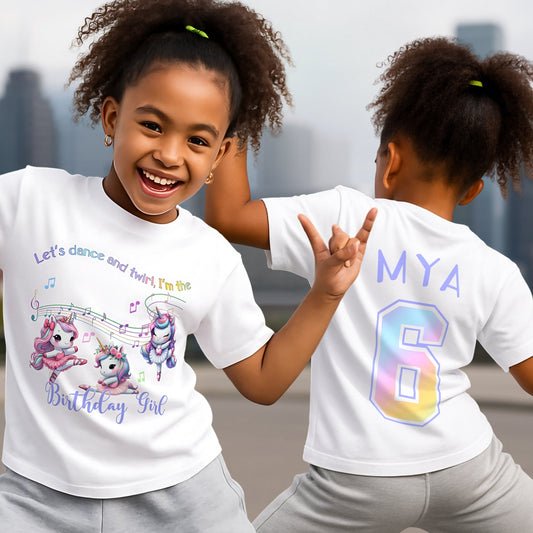 personalised unicorn birthday t-shirt for girls with custom name and age, featuring a cute dancing unicorn design on soft cotton, the perfect unicorn birthday outfit for party celebrations, cake cutting, twirling, and keepsake photos.
