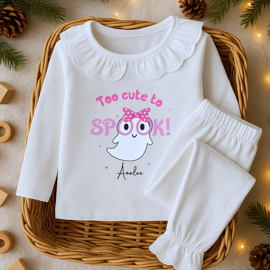 Personalised Halloween pyjamas for girls with “Too Cute to Spook” ghost design on white frill set.
