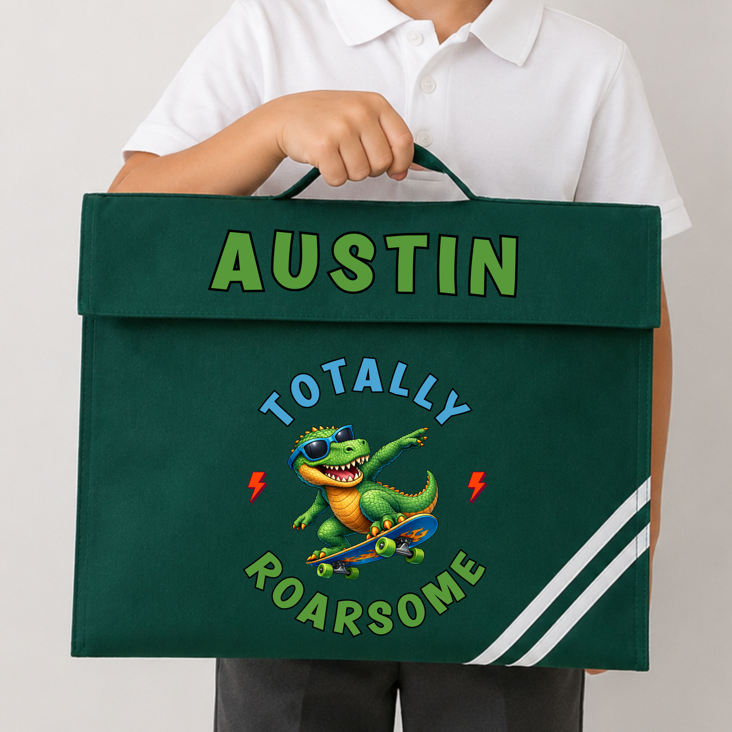 Personalised Back to School Book Bag, Boys School Book Bag with name and colourful skateboarding dinosaur design, available in green, navy, royal blue and burgundy.