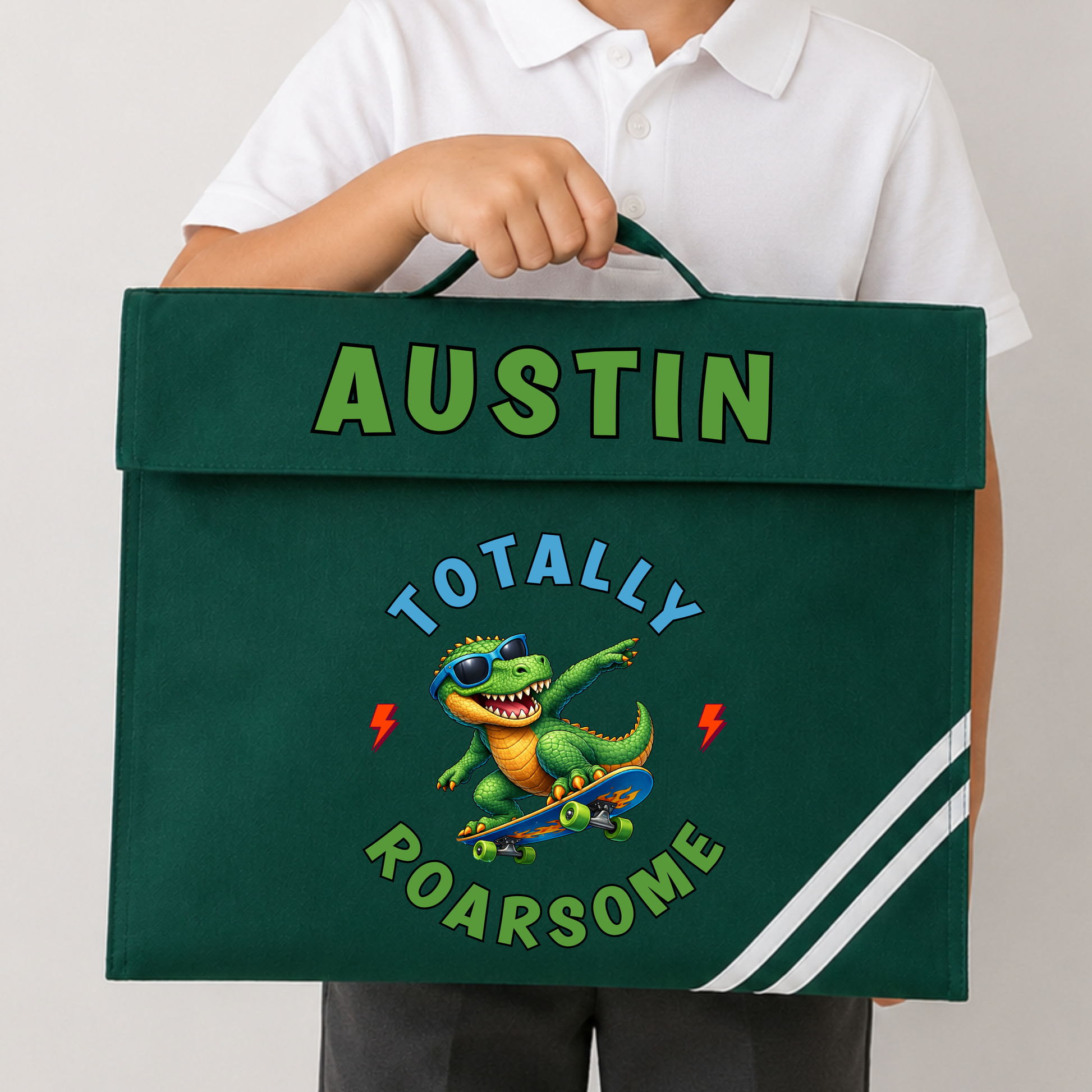 Personalised Back to School Book Bag, Boys School Book Bag with name and colourful skateboarding dinosaur design, available in green, navy, royal blue and burgundy.