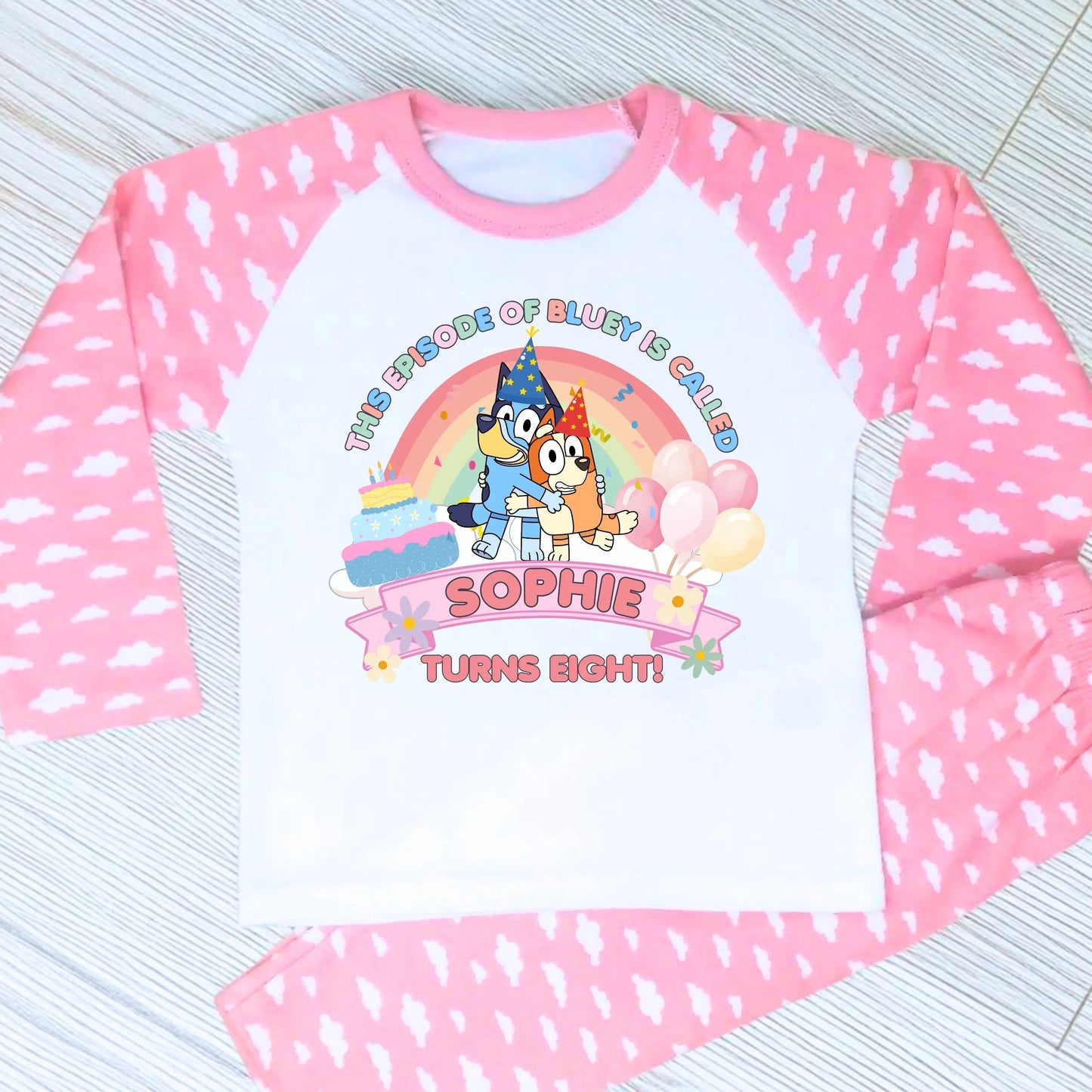 Bluey and Bingo Birthday Pyjamas for Girls with custom name and age in a pink party-themed design.
