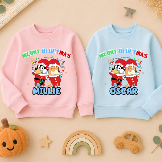 Personalised Christmas Jumper for kids featuring a festive Merry Blueymas design with Bluey and Bingo, personalised with your child's name.