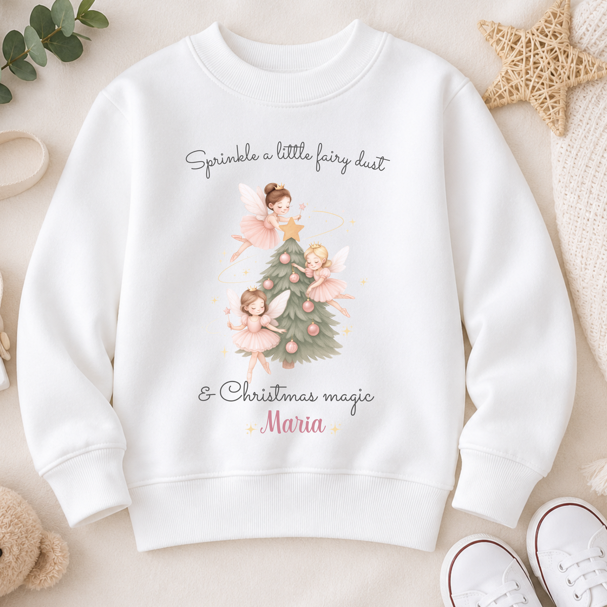 Girls Christmas Sweatshirt with personalised name, featuring three pink fairies decorating a festive Christmas tree with soft pink baubles.