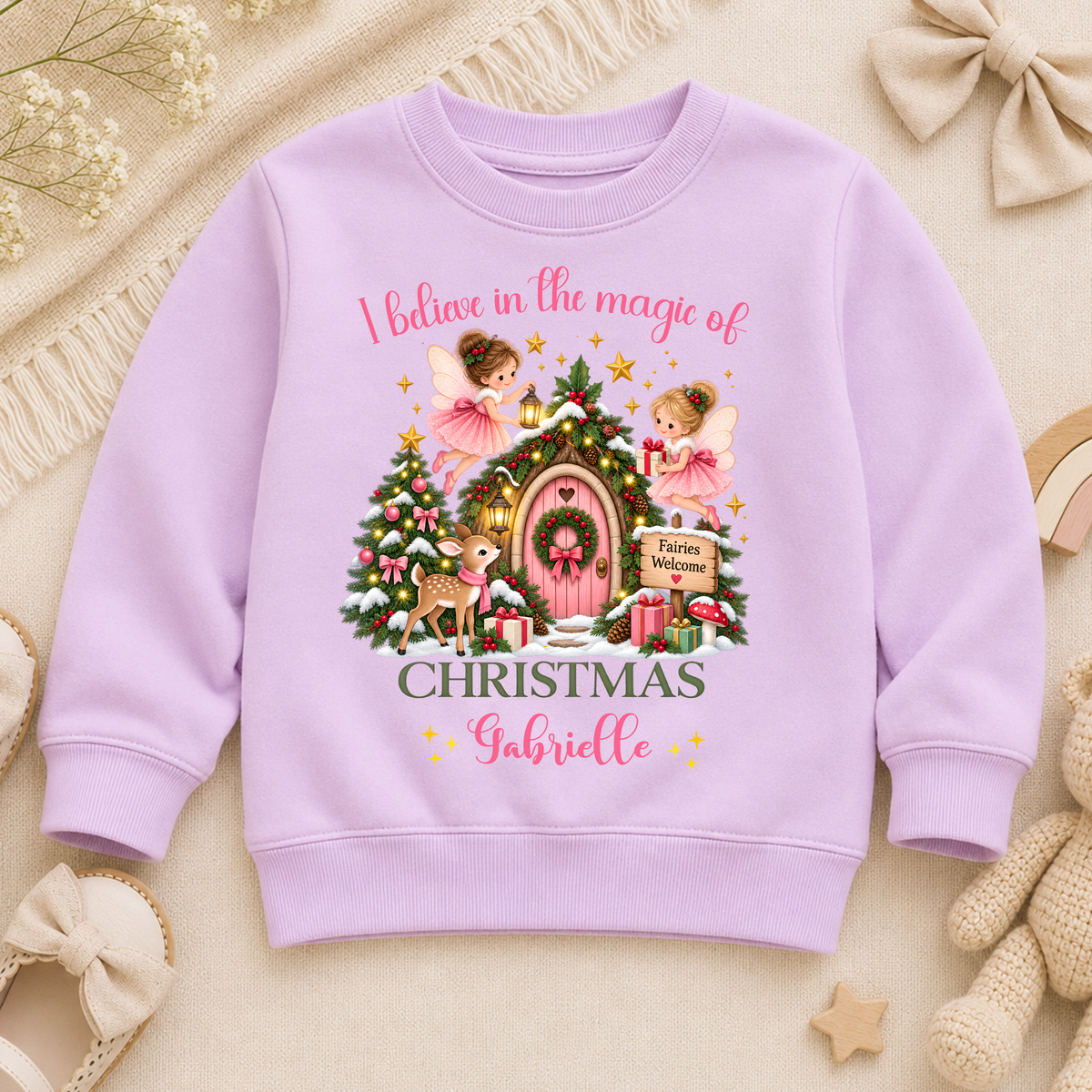 Personalised Christmas Sweatshirt for girls with magical fairies, pink fairy door, Christmas tree, woodland deer and child’s custom name.