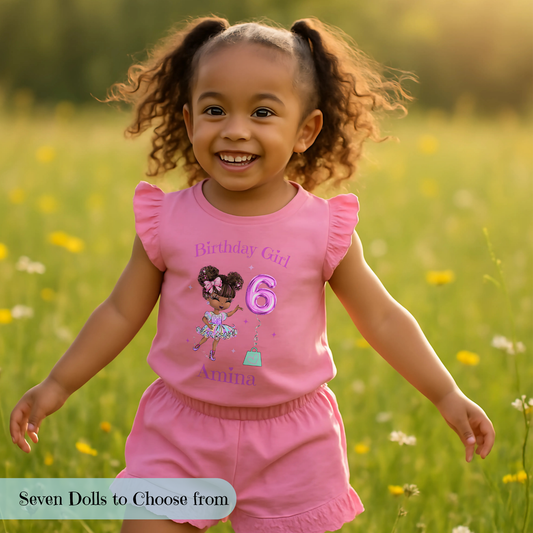 A vibrant and colourful personalised birthday outfit for girls, featuring a glitter-like design reminiscent of a pop star's ensemble. The set includes frilly shorts and a matching top, both adorned with rainbow hues, offering a playful and festive look. This personalised birthday girl outfit is perfect for a birthday celebration, capturing the spirit of fun and fashion. It also comes with a custom rainbow doll in the design, making it an ideal gift for young fashion enthusiasts.