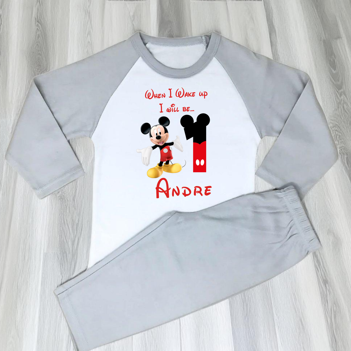 Personalised Birthday Pyjamas with mickie mouse inspired design, child's name and age, available in red or grey