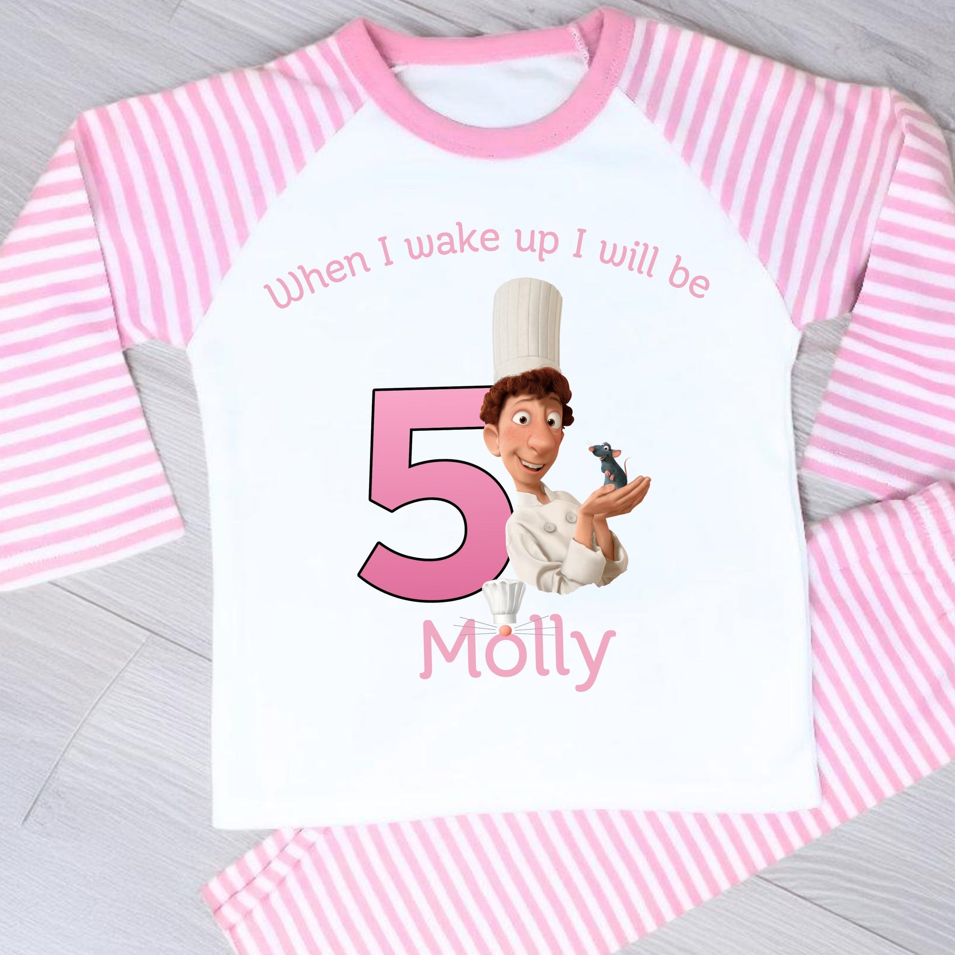 Ratatouille birthday pyjamas: Pink and white striped personalised birthday pyjamas with ratatouille character with name and age