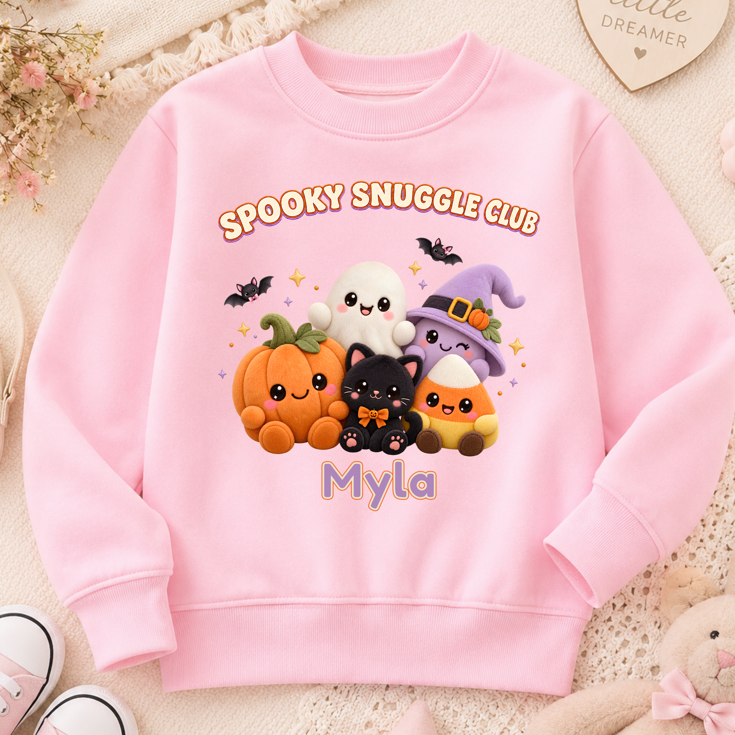 Personalised Halloween Sweatshirt for Kids with kawaii plush pumpkin, ghost, witch, black cat and candy corn Spooky Snuggle Club design.