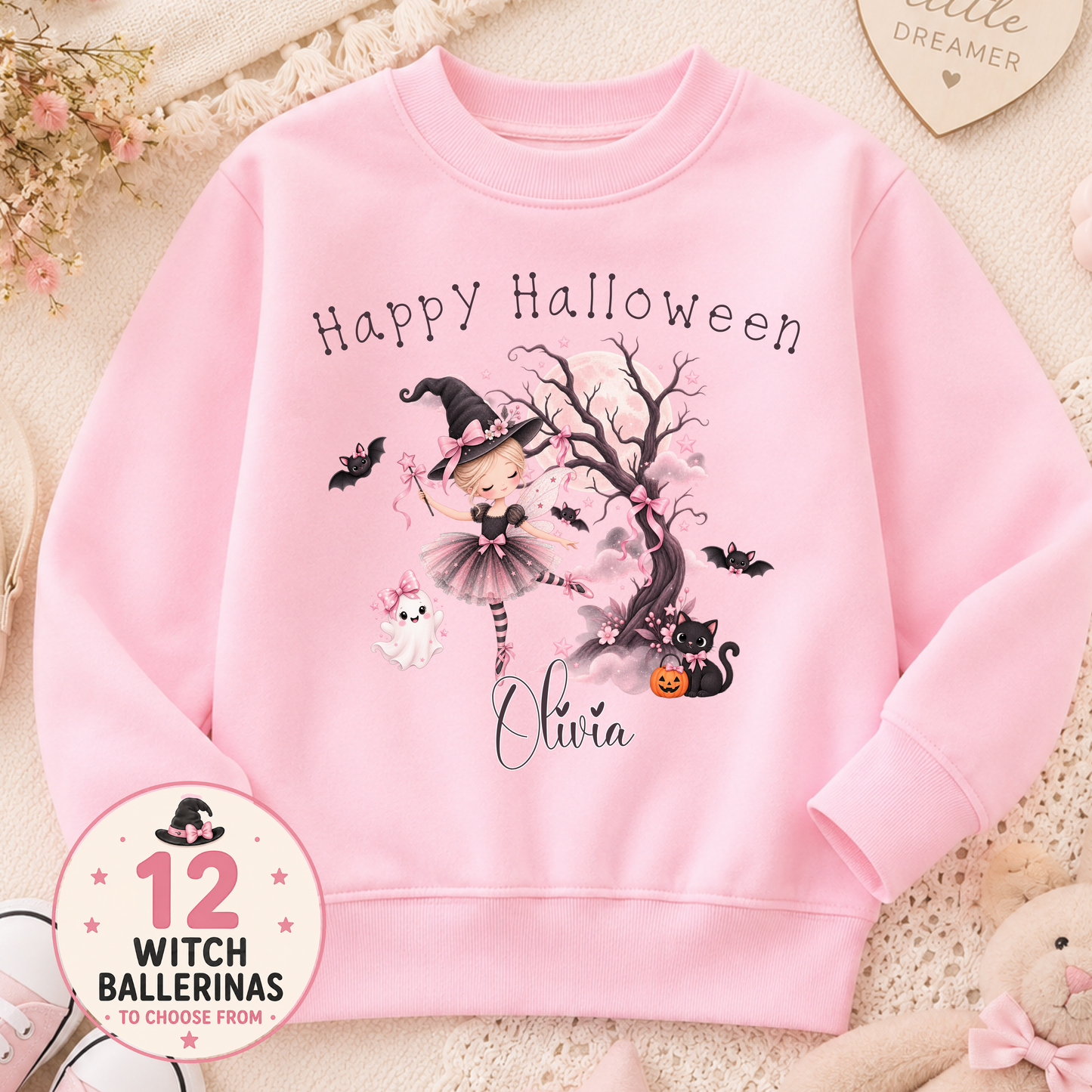 Personalised Halloween Sweatshirt for girls with witch ballerina, black cat, ghost, bats and child's name in pink Halloween design.