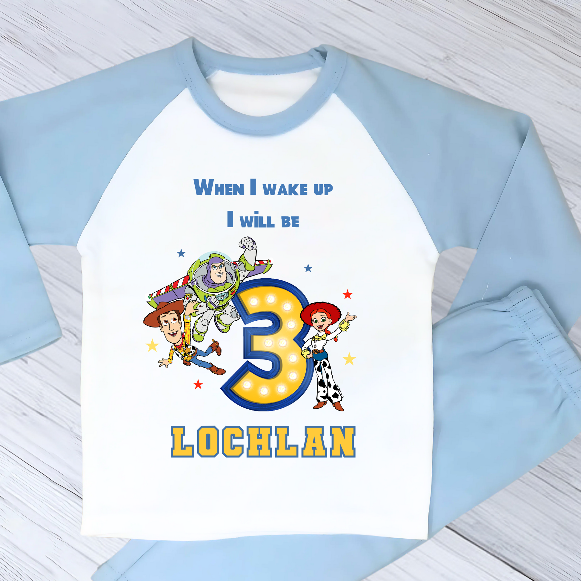 Toy Story birthday pyjamas for boys with custom name and age, featuring Buzz Lightyear, Woody, and Jessie, bold birthday number in Toy Story colours, and name printed underneath, soft and comfy sleepwear set for birthday mornings