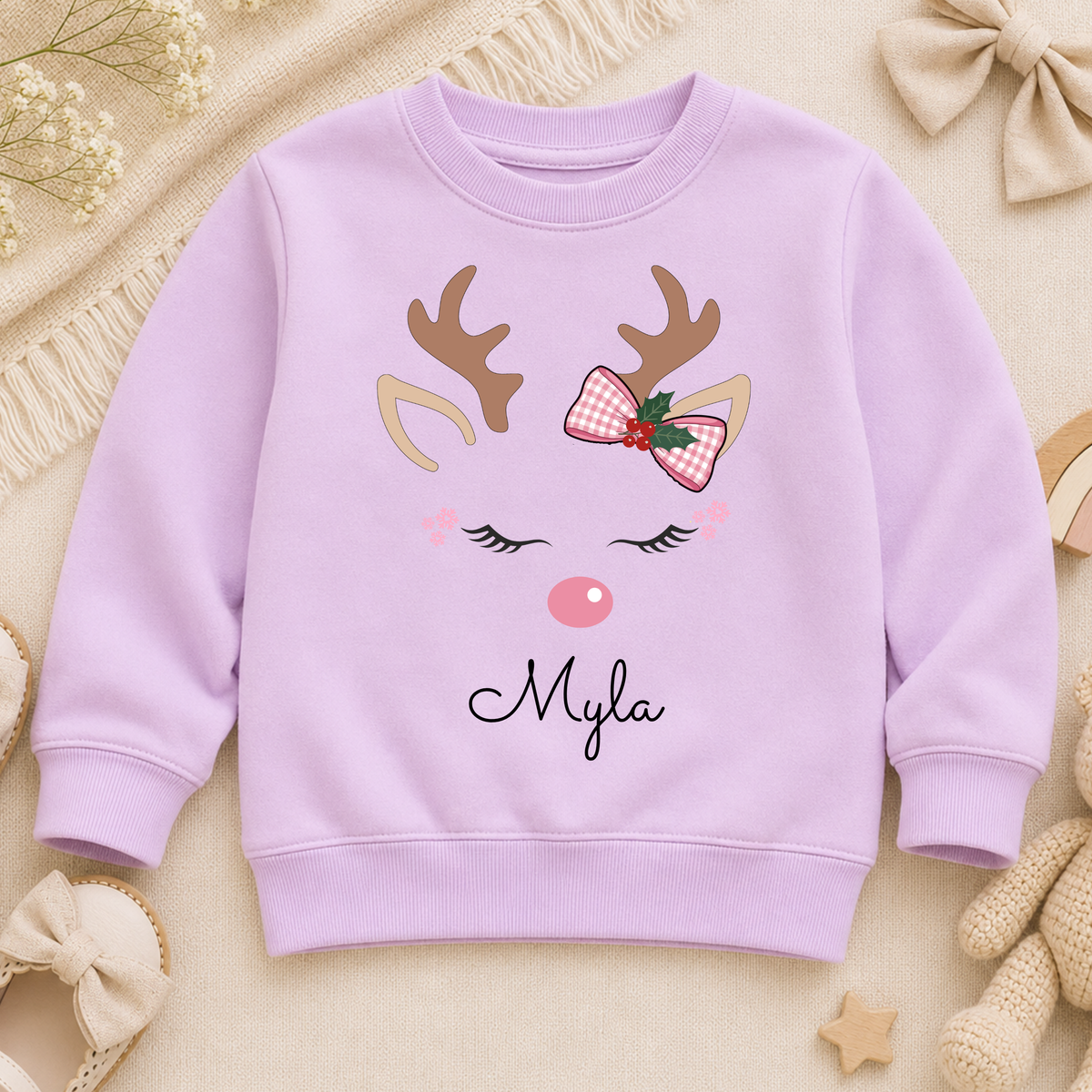 Girls Christmas Sweatshirt: Personalised Christmas sweatshirt for girls with pink reindeer design and custom name print.