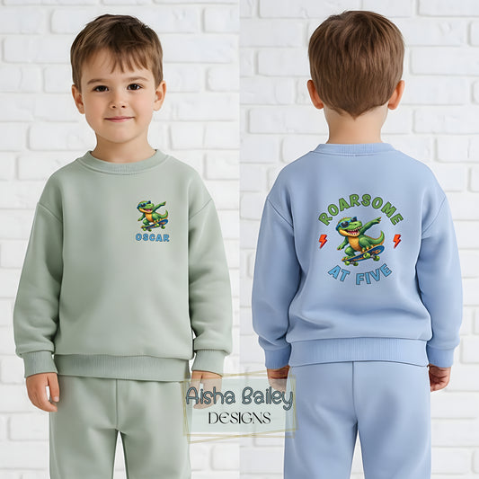 Personalised Dinosaur Birthday Loungewear Set for Boys with custom name sweatshirt and Roarsome at Any Age back print, matching bottoms co-ord outfit