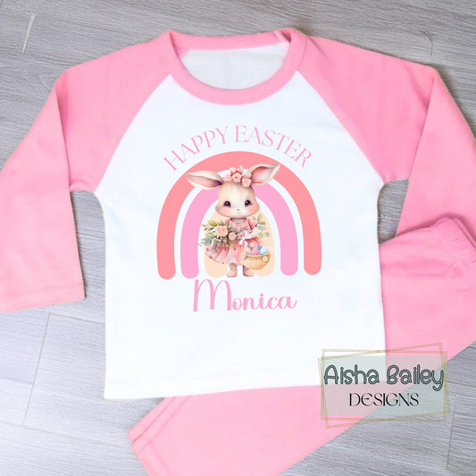 Personalised Easter Pyjamas for girls with their custom name. Bunny Rainbow design in soft pink pastel tones