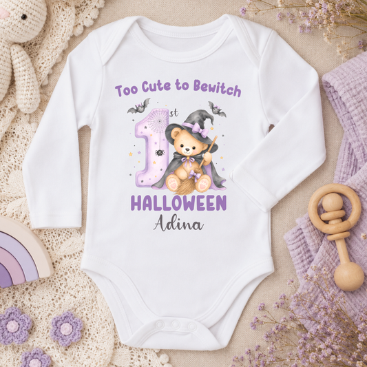Personalised First Halloween Baby Outfit: Baby’s First Halloween personalised baby girl bodysuit with name, teddy bear witch, bats and first Halloween design.