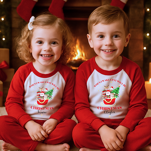 Personalised Christmas pyjamas with Father Christmas sleigh design for boys and girls, When uI wake up it will be Christmas