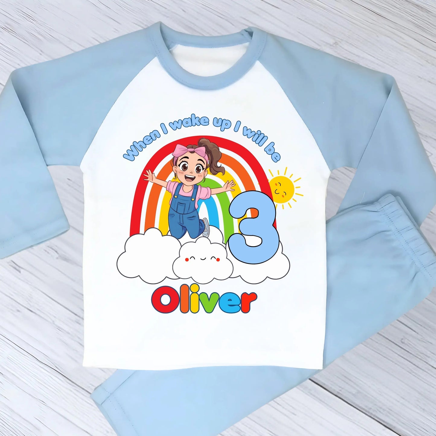 Personalised boys Ms Rachel birthday pyjamas with rainbow design and name printed on top