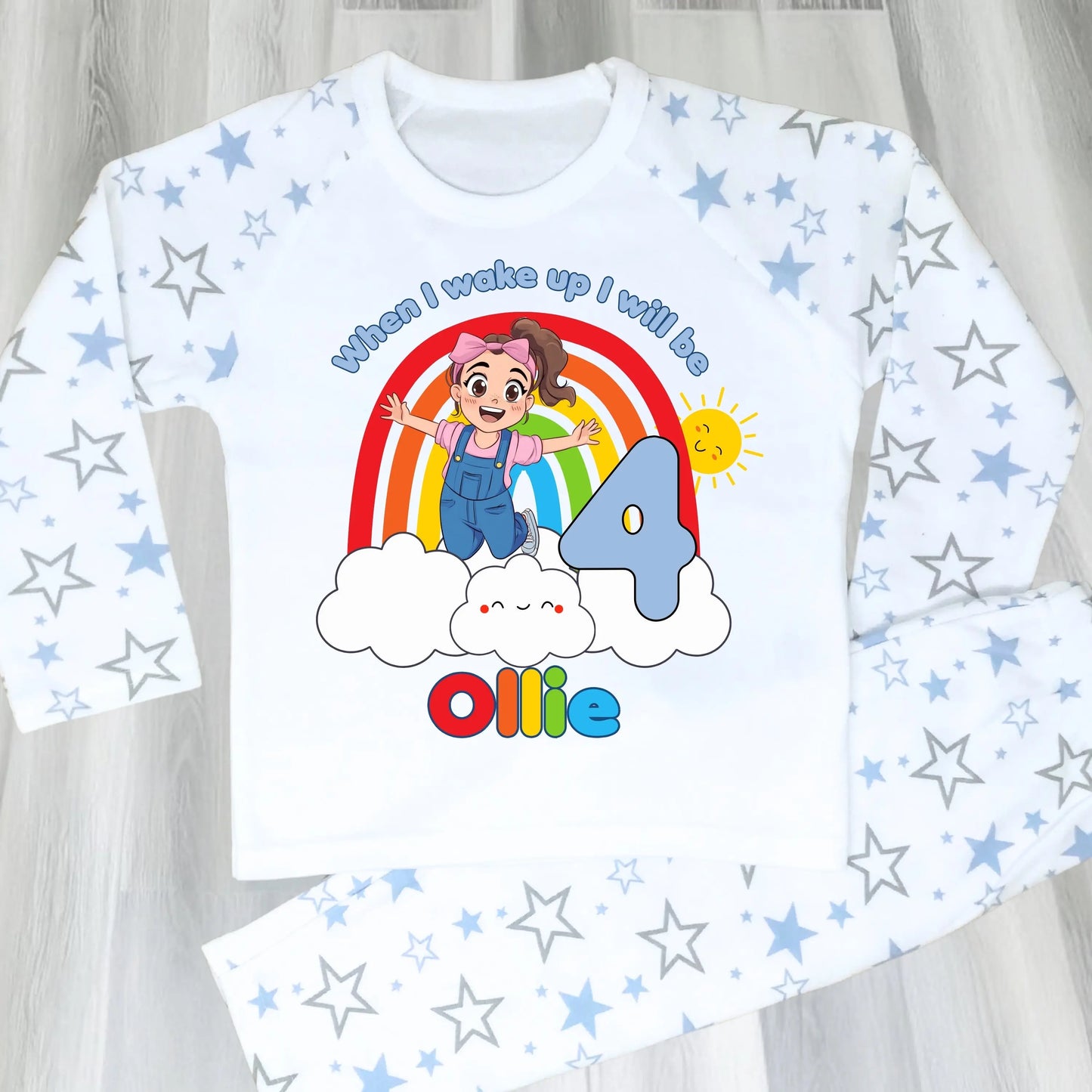 Personalised boys Ms Rachel birthday pyjamas with rainbow design and name printed on top