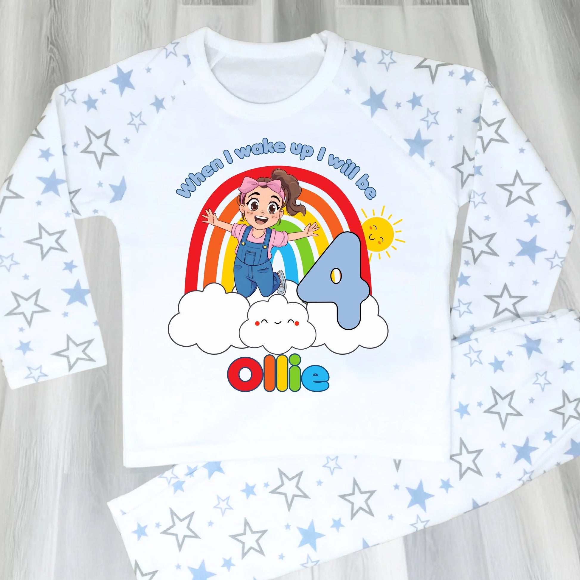 Personalised boys Ms Rachel birthday pyjamas with rainbow design and name printed on top