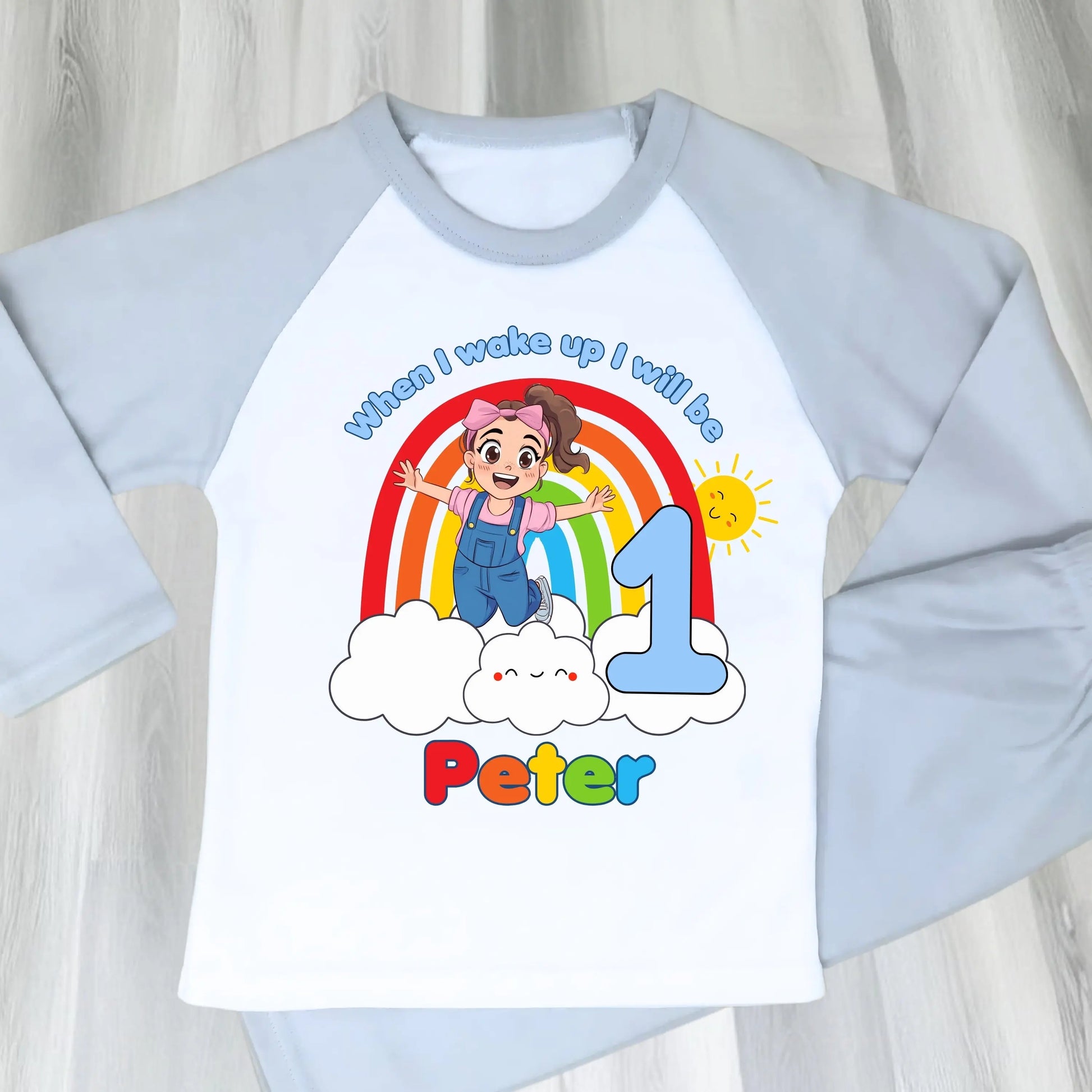 Personalised boys Ms Rachel birthday pyjamas with rainbow design and name printed on top