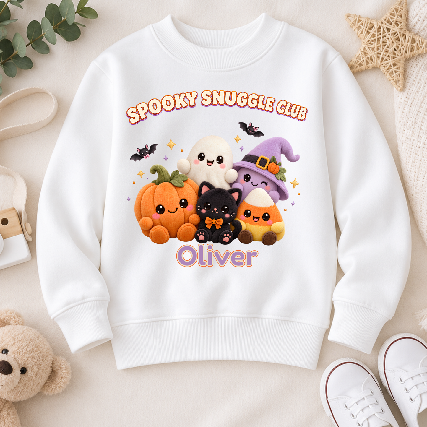 Personalised Halloween Sweatshirt for Kids with kawaii plush pumpkin, ghost, witch, black cat and candy corn Spooky Snuggle Club design.