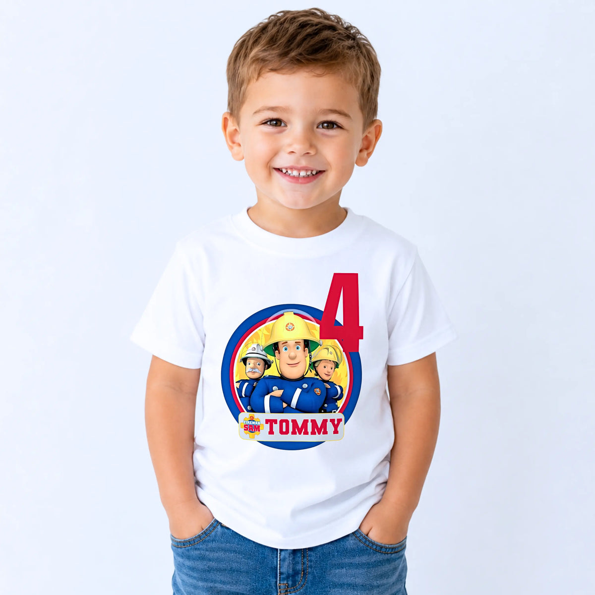 Personalised Fireman Sam birthday T-shirt for boys featuring a custom name and age with a colourful Fireman Sam-inspired design, perfect for birthday parties, cake smash photos and special celebrations.
