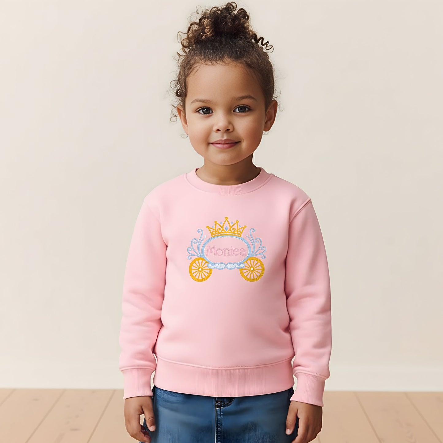 Princess Embroidered sweatshirt: Baby wearing a personalised embroidered princess carriage sweatshirt for girls made with premium threads and detailed stitching.