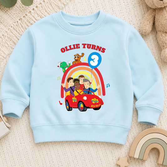Boys Personalised Wiggles Birthday Sweatshirt with colourful character design, customised with any name and age for a fun boys birthday outfit.