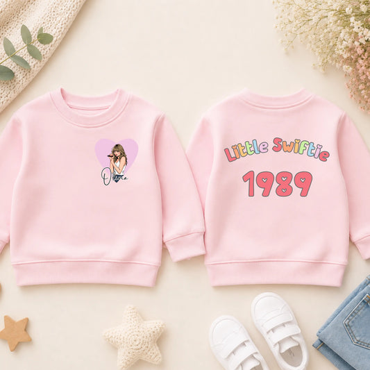 Girls Little Swiftie Sweatshirt: Personalised Taylor Swift Jumper for Everyday Wear AishaBaileyDesigns