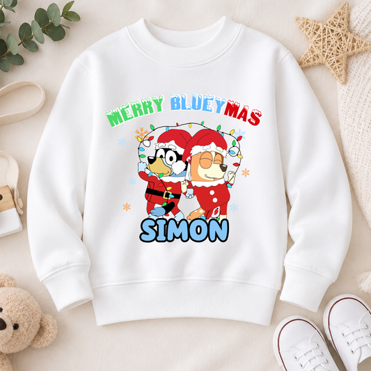 Personalised Christmas Jumper for kids featuring a festive Merry Blueymas design with Bluey and Bingo, personalised with your child's name.
