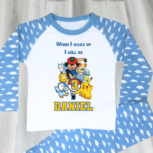 Pokomon birthday pyjamas: Children's PJst with Pokomon characters and text on a light blue and white background