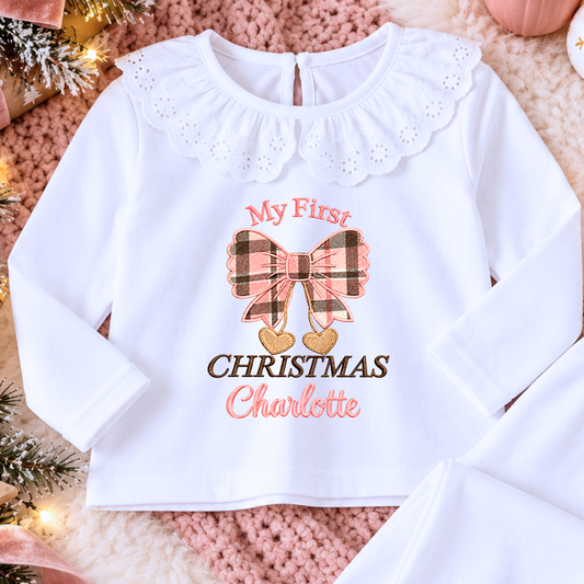 Personalised First Christmas Pyjamas for Girls with embroidered pink plaid tartan bow, gold hearts and name on white pyjamas