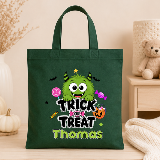 Personalised Halloween Trick or Treat Bag for kids with name and choice of 14 cute colourful monster designs for collecting Halloween sweets.