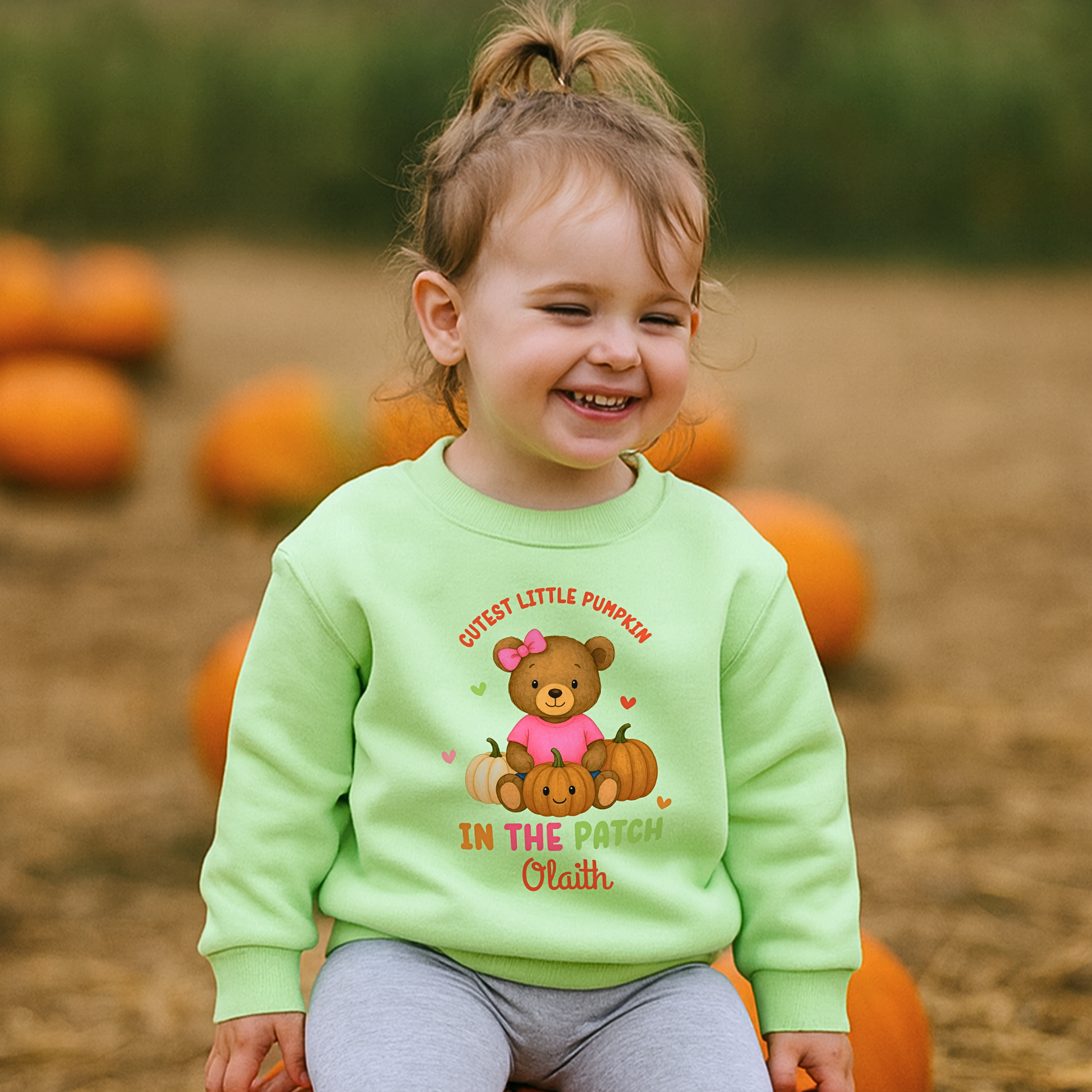 Personalised Halloween sweatshirt for kids with teddy bear and “Cutest Pumpkin in the Patch” design.