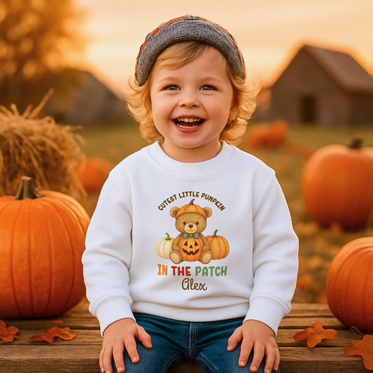 Personalised Halloween sweatshirt for kids with teddy bear and “Cutest Pumpkin in the Patch” design.