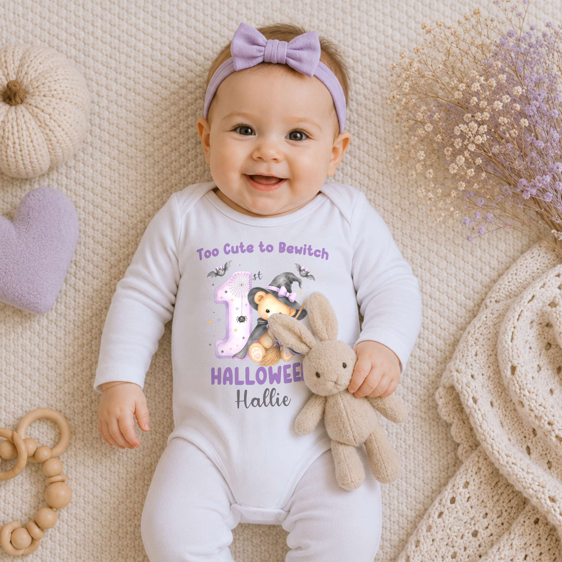 Personalised First Halloween Baby Outfit: Baby’s First Halloween personalised baby girl bodysuit with name, teddy bear witch, bats and first Halloween design.