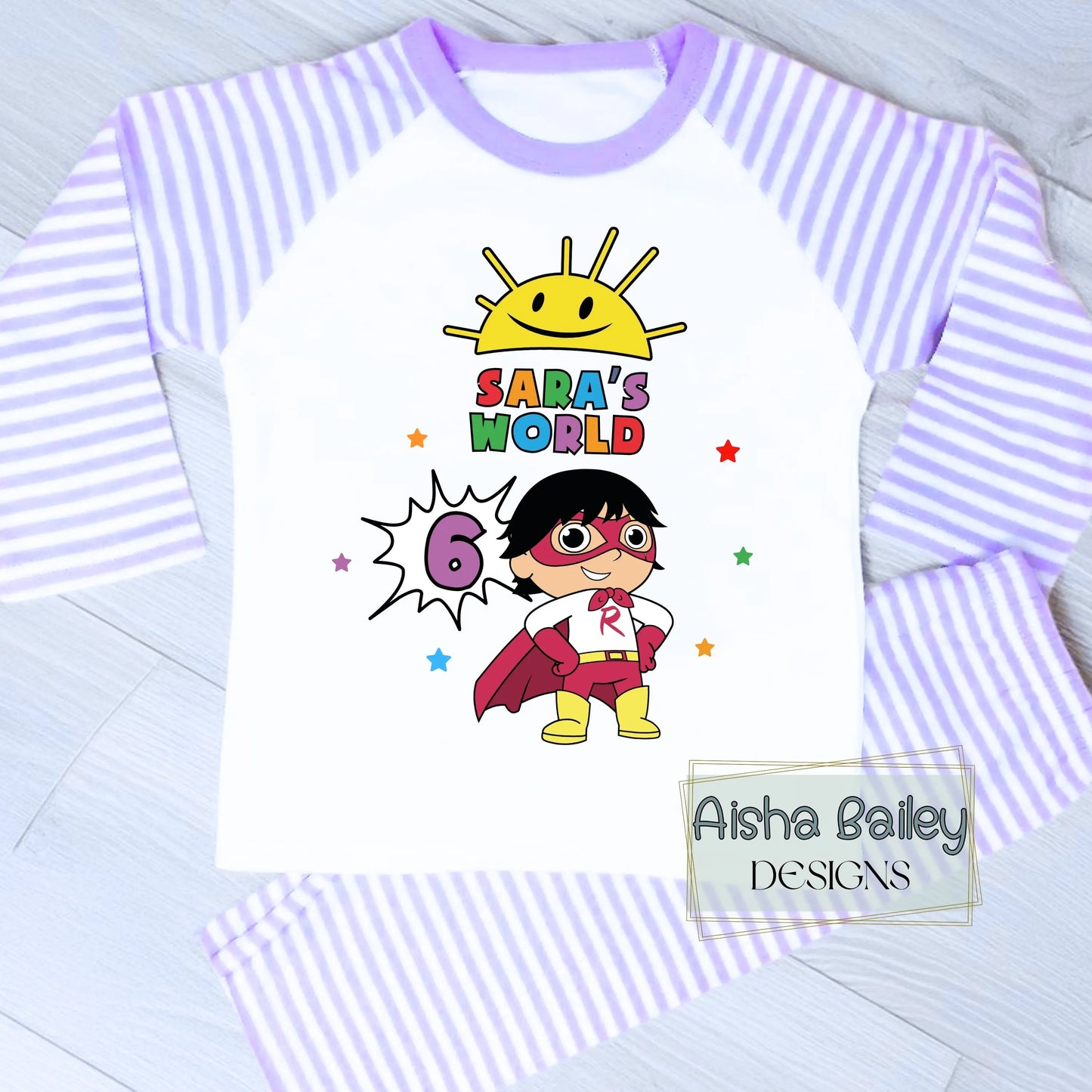 Ryan's World personalised birthday pyjamas for girls with colourful superhero design