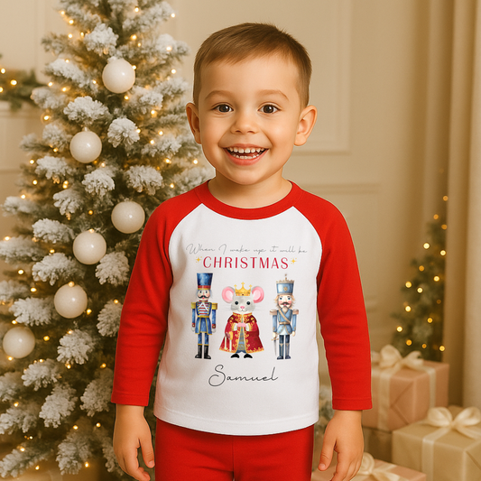 Nutcracker christmas pyjamas, A set of personalised boys Nutcracker-themed Christmas pyjamas, featuring the festive phrase “When I Wake Up It Will Be Christmas.” These cosy christmas pyjamas are adorned with whimsical Nutcracker illustrations, perfect for adding a touch of magic to a child's Christmas Eve: personalized, boys, Nutcracker, Christmas pyjamas, festive, holiday, cosy, magical.