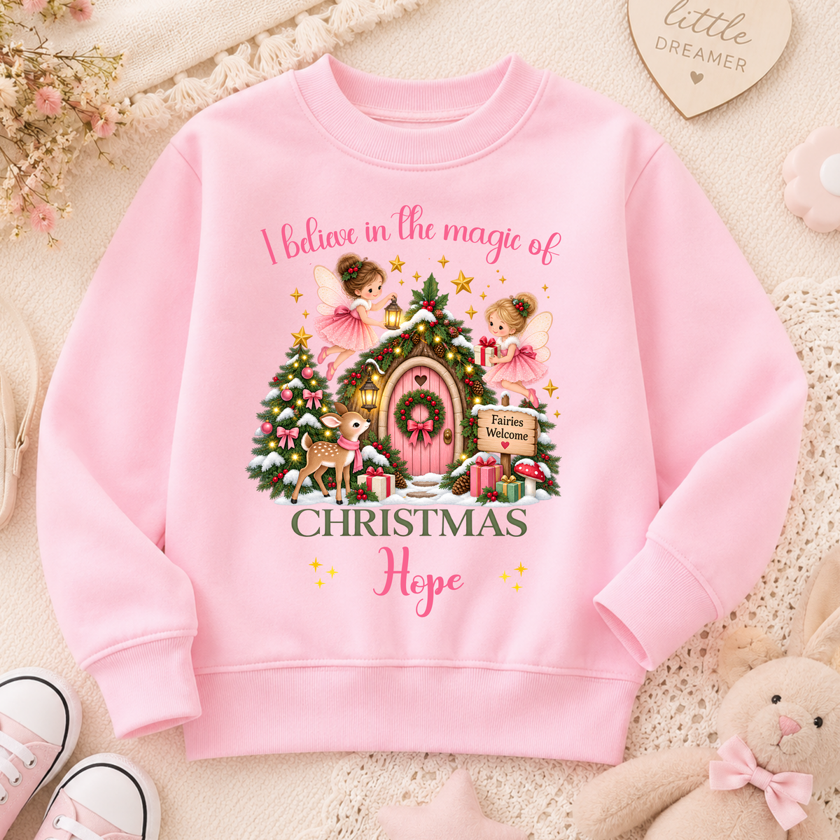 Personalised Christmas Sweatshirt for girls with magical fairies, pink fairy door, Christmas tree, woodland deer and child’s custom name.