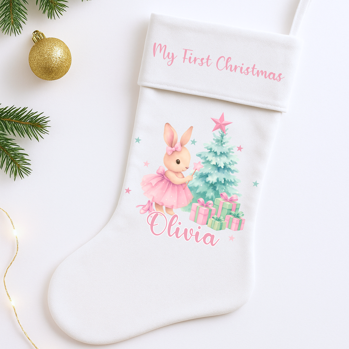 Personalised Christmas Sack and stocking for baby girl’s first Christmas, featuring a sweet bunny design and custom name for a magical Christmas keepsake.