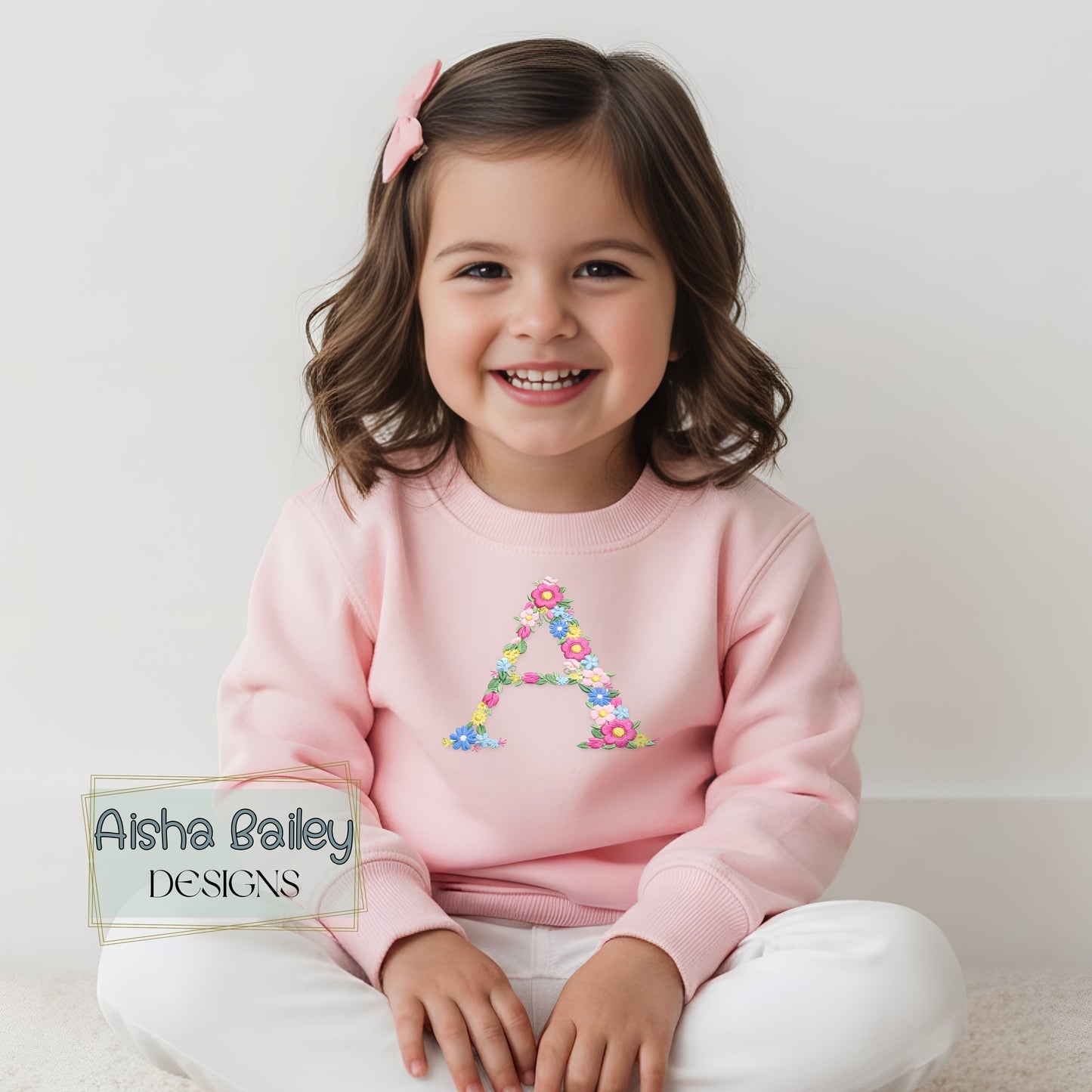 Personalised Embroidered Sweatshirt for girls with embroidered initial in pastal colours and floral