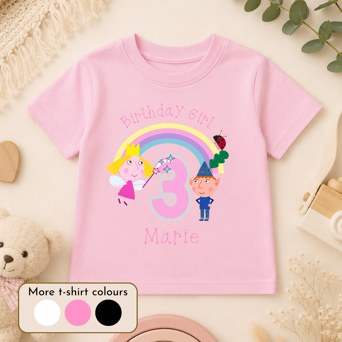 Personalised Ben and Holly Birthday T-Shirt for girls with name, age, rainbow, fairy and elf birthday design, available in pink, white and black.