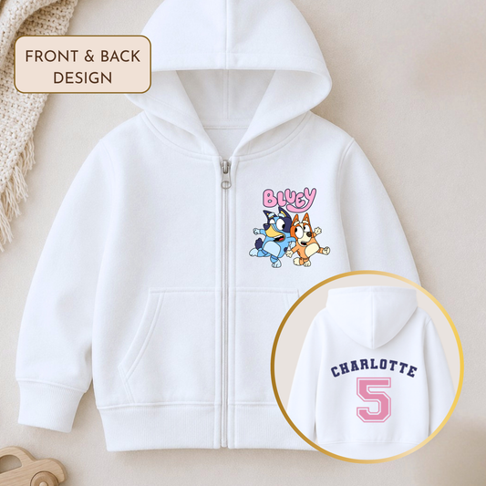 Personalised Girls Birthday Hoodie featuring Bluey and Bingo on the front, with your child's name and birthday age in a pink varsity-style design on the back.