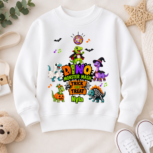 Personalised Halloween Sweatshirt for kids with name, colourful Dino Monster Mash dinosaurs, Trick or Treat design and cute Halloween characters.